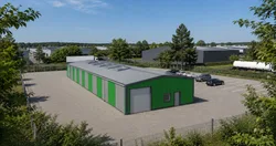 Hala BSE G1/3MW — widok z elewacji, otoczenie zieleni